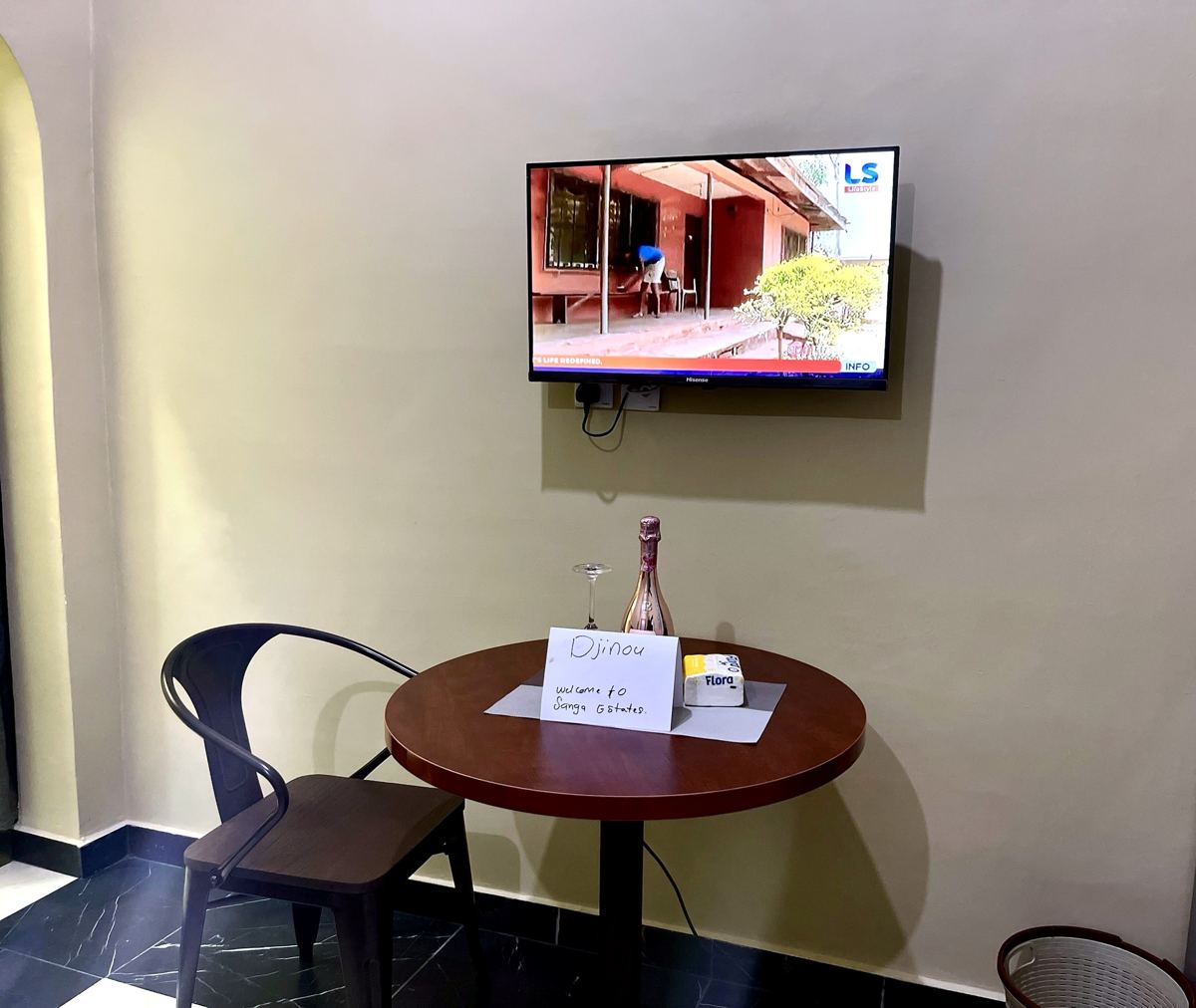 Economy studio suite with full size bed, AC, smart TV, sofa, dining table, mini fridge and ensuite bathroom