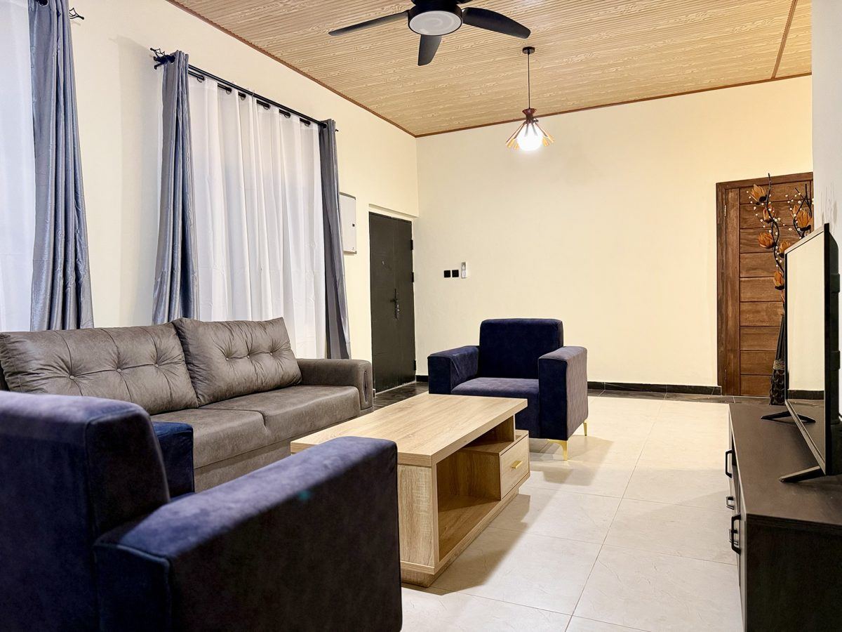 Luxury 1 bedroom, Open-plan living room with sofa, armchairs and TV