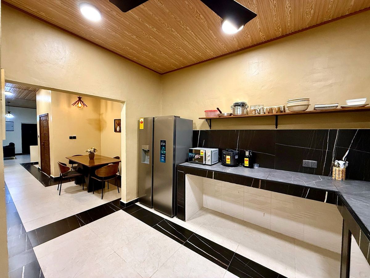 Luxury 1 bedroom, Fully equipped kitchen with refrigerator and dining table